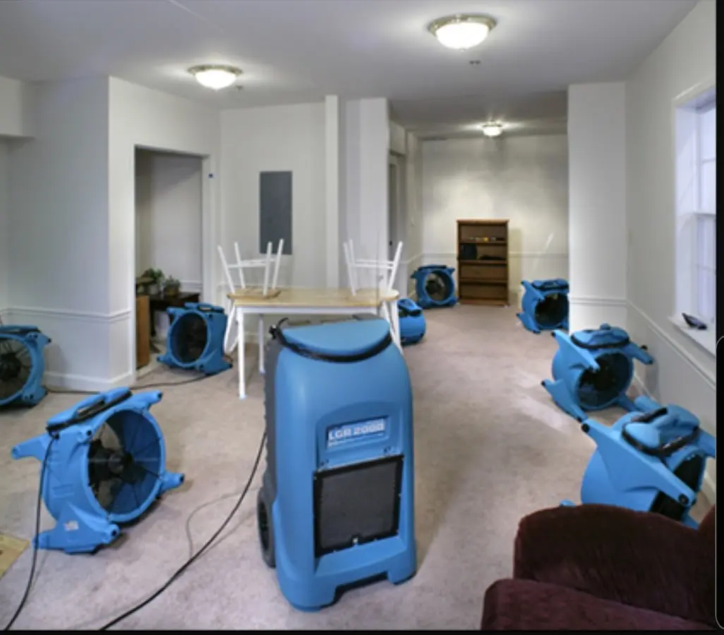 Air movers and dehumidifier setup for Water Damage Restoration in Cambridge